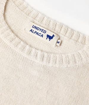 Woven label on an alpaca sweater