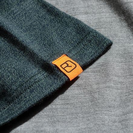Orange woven brand label